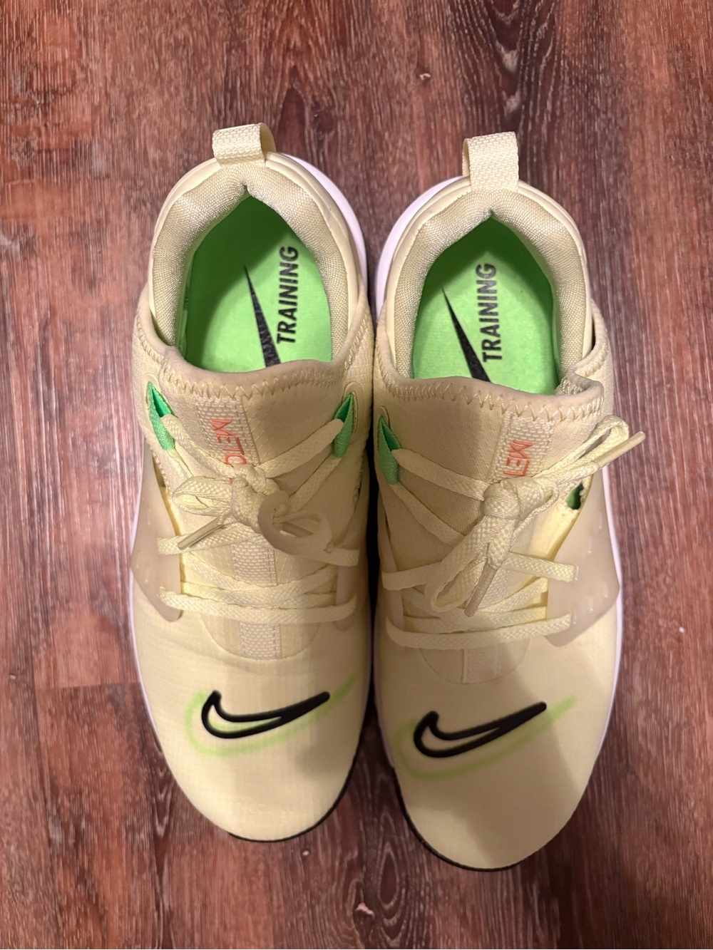 Nike women’s Yellow Sneakers with Black Swoosh and Green Accents - Picture 2 of 4